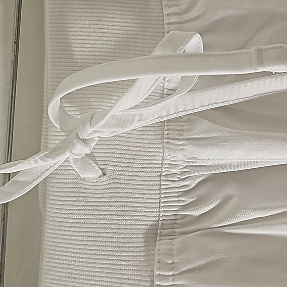 Scrubs, butter-soft. White with lots of pockets.  Cuff style. Size small… - Picture 2 of 8